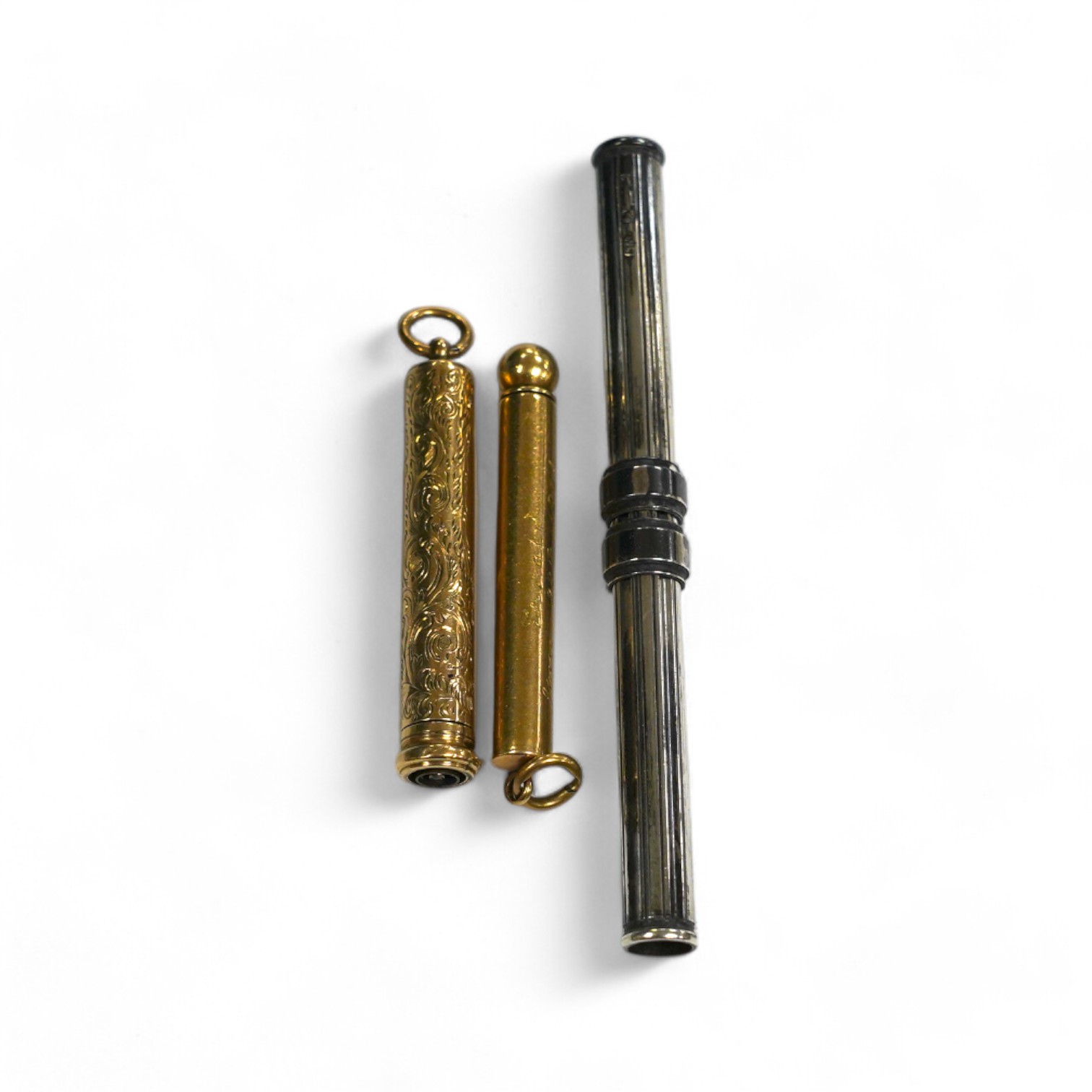 Two yellow metal overlaid propelling pencils, including late Victorian with engraved inscription, 54mm and one other silver cased propelling pencil and pen combination, 10cm long when closed. Condition - fair